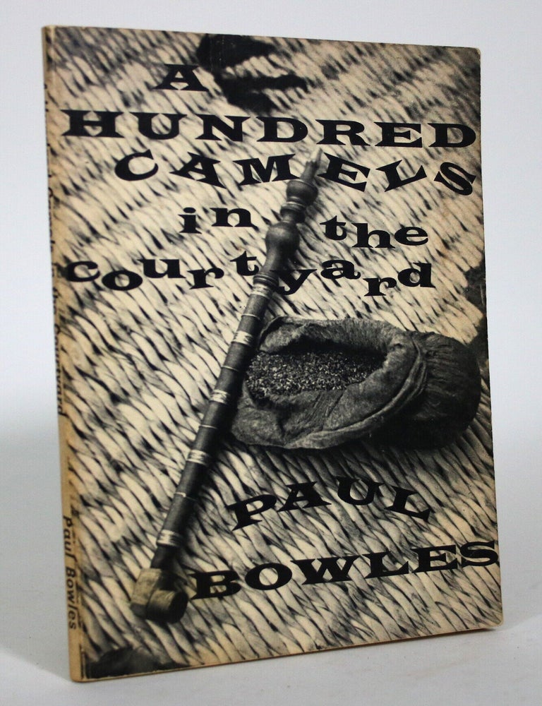 Item #016537 A Hundred Camels in the Courtyard. Paul Bowles.